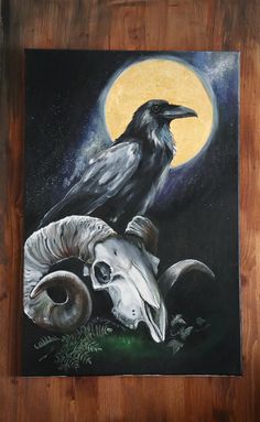 a painting of a black bird sitting on top of a ram's head with a full moon in the background