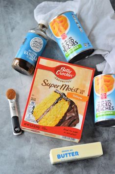 the ingredients needed to make a cake are displayed on top of a gray countertop