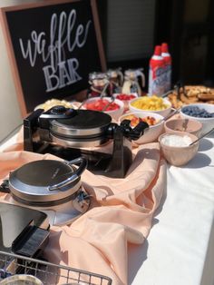 a buffet table with food and drinks on it