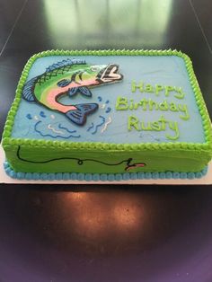 a birthday cake with a fish on it