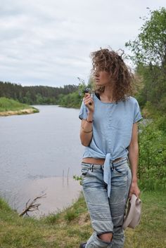 "Excellent denim blouse for your midsummer nights. It is not a mistake - buttons are on the back! Size: label says S, seems like women's (S) MEASUREMENTS: Length: 57 cm/ 22\" (without ties) Shoulder to shoulder: 50 cm/ 20\" Chest: 116 cm/ 46\" Condition: excellent Fabric: Lyocell Brand: unknown * Wash at temperature not higher than 30oC / 86oF Model wears: UK 8/ EU 36/ US 4 Model's height: 175 cm/5'7\" You can find more similar shirts here: https://www.etsy.com/shop/OnTheRoadStore?section_id=239 Short Sleeve Denim Top For Summer, Summer Denim Blue Top With Short Sleeves, Light Indigo Short Sleeve Denim Top For Summer, Denim Beach Top With Short Sleeves, Beach Denim Short Sleeve Top, Light Wash Short Sleeve Denim Top For Summer, Summer Chambray Denim Shirt, Casual Denim Blue Summer Shirt, Trendy Light Wash Denim Blouse