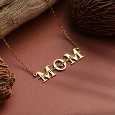 Mom Necklace,Solid Gold Nameplate Necklace,Necklace For Mothers Day,10k 14k 18k Real Gold Mom Necklace For Christmas,Necklace For Women This necklace is handmade and produced with 10k 14k 18k solid gold according to your preference. Our gold color options: Yellow Gold,White Gold, Rose Gold Pendant Sizes: height: 0.35 inches (9mm) width: 1.38 inches (35mm) We have 3 Types solid gold chain options: Type1 Chain (0.85mm thick) Type2 Chain (0.97mm thick) Type3 Chain (1.30mm thick) We use lobster claps on our chains. Chain length: 14 inches adjustable 13 inches 16 inches adjustable 15 inches 18 inches adjustable 17 inches 20 inches adjustable 19 inches 22 inches adjustable 21 inches The necklace is made to order. We make it ready for shipment within 3 business days.  Please contact us using the Stamped 14k Rose Gold Necklace For Mother's Day, Mother's Day 14k Stamped Necklace Gift For Mom, Personalized 14k Name Necklace For Mother's Day, Mother's Day 14k Yellow Gold Name Necklace, Mother's Day 14k Stamped Yellow Gold Name Necklace, Personalized 14k Stamped Name Necklace For Mother's Day, Mother's Day Personalized 14k Stamped Name Necklace, 14k Gold Nameplate Jewelry For Mother's Day, 14k Stamped Jewelry For Mother's Day Personalized Gift