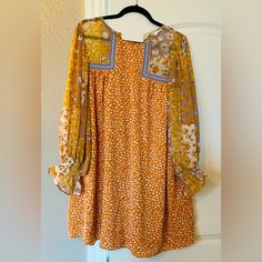 Boho Style, Long Sleeve Shift Dress. Purchased From An Online Boutique But Never Worn. Size Medium But Does Run Large. Yellow Printed Fall Dress, Orange Long Sleeve Shift Dress, Yellow Shift Dress For Vacation, Yellow Bohemian Dress For Fall, Yellow Bohemian Fall Dress, Yellow Floral Print Dress For Fall, Yellow Floral Print Fall Dresses, Yellow Floral Print Dresses For Fall, Fall Floral Print Yellow Dress