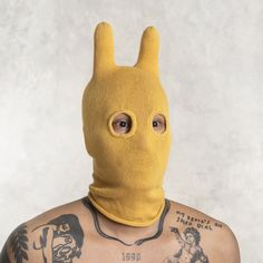 MANGO SOCKY BALACLAVA - BLAMO CLOTHING BALACLAVA We like to think of Socky as the outer manifestation of your inner wild child. Surreal, silly, and certainly singular, our better balaclava is designed to jumpstart your adventure times. FEATURES Hand knit 100% cotton (mango / gold / marigold colorway) One size fits all CARE Machine wash gentle cycle, hang to dry ----- FOR OTHER MASK OPTIONS, PLEASE VISIT OUR OTHER ETSY STORE, BLAMO TOYS, AT https://www.etsy.com/shop/BlamoToys BLAMO NEWSLETTER: https://manage.kmail-lists.com/subscriptions/subscribe?a=QfdKRs&g=PCw4jr WEBSITE: blamo.store Thanks for visiting. Feel free to email us with any questions, suggestions, or comments. Balaclava Mask, Animal Mask, Stocking Cap, Animal Masks, Yellow Knit, Poses References, Easy Halloween Costumes, Ski Mask, Wild Child