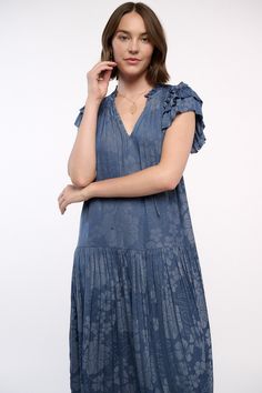 This jacquard maxi dress feels particularly breezy thanks to the dropped waist and shin-skimming pleats. Done in Parisian blue with a floral motif woven in, it's got a sweetly tied neckline, smocked detailing, and tiered short sleeves edged by picot stitching. "•Split neckline with self-tie •Relaxed fit •Ruffle trim •Short sleeves •Dropped waist •Pleated skirt •Mid-length hem DIMENSIONS •Standard: 50 Length" Item number 2090410-1 100% Polyester Hand Wash Cold Blue Smocked Dress With Ruched V-neck, Summer V-neck Midi Dress With Smocked Cuffs, Bohemian Blue Smocked Midi-length Dress, Spring Blue V-neck Smocked Dress, Parisian Blue, V-neck Rayon Midi Dress With Ruffle Hem, Floral Jacquard, Drop Waist, Ruffle Trim