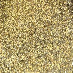 a close up view of some gold glitter