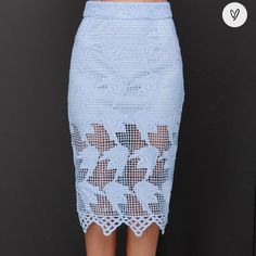 Why Wait Another Day For A Pretty Midi To Come Around, When The Joa Elegant Hardly Wait Powder Blue Lace Midi Skirt Is Here Right Now?! Lovely Crocheted Lace Makes Its Way From A Banded High-Waist Into A Fitted Midi Skirt. The Lining Ends At Mid-Thigh With The Sheer Lace Ending In A Scalloped Hem At Bottom. Back Kick Pleat. Hidden Back Zipper With Clasp. Lined To Mid-Thigh. 100% Polyester. Dry Clean Only. Imported. Style 193426 C Fitted Blue Pencil Skirt For Summer, Light Blue Mini Skirt For Spring Party, Light Blue Mini Skirt For Summer Party, High Waist Light Blue Skirt, Light Blue Party Mini Skirt For Spring, Summer Party Light Blue Mini Skirt, Spring Party Light Blue Mini Skirt, Blue Pencil Skirt For Summer, Blue Summer Pencil Skirt