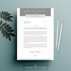 a professional resume template on top of a desk next to a pen and pencils