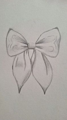 a pencil drawing of a bow on a piece of paper