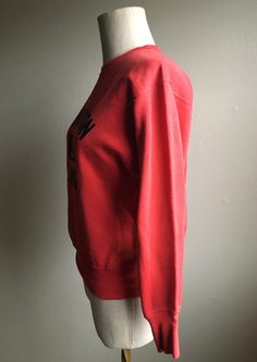 "1960s vintage pullover sweatshirt Brand- Athletic Supply made in USA cotton red with black lettering faded stitching Washington Junior High 3 wide ribbed sleeve cuff/waist hem band ribbed underarm panels authentic distressed quality small stain right sleeve cuff repairs to back ribbed hem/left sleeve above cuff label size small measures, lying flat, shoulder-17\" sleeve-20 1/2\" chest-19\" hem-14 1/2\" length-23\"" Red Collegiate Cotton Sweater, Red College Sweater With Ribbed Cuffs, Retro Red Cotton Sweater, Red Collegiate Sweatshirt With Ribbed Cuffs, Red College Sweatshirt With Ribbed Cuffs, Vintage Red Crew Neck Sweater, Red Vintage Crew Sweater, Red Cotton Sweatshirt With Screen Print, Retro Red Top With Ribbed Cuffs