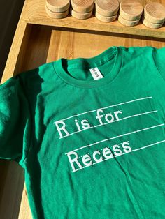 Kids shirt for school! Who doesn't love recess? It's the best part of the day!  This shirt is perfect for the kid who lives for recess!!  Limited quantity and when they're gone, they're gone! The Details: - Kelly green short sleeve tee - only sizes youth small and youth medium - screen printed (not vinyl heat press!) so feel free to toss in washer and dryer!  *we do recommend turning inside out for longest life* - 100% cotton so will shrink some! - small is around a 6-8, medium is around a 10 FR Spring Tee, Thanksgiving Clothes, Spring Tees, Green Tee, Champion Reverse Weave, Handmade Kids, Sports Tees, Golf Shirt, Green Shorts