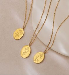 Our jewelry comes ready to gift with a Anavia gift box, blank card, and a organza bag. | The lovely 18k gold oval pendant features a lovely engraving of a birth flower on the front and the month and flower name on the back. Material: Stainless SteelSize: 7/8" x 9/16"Chain: 18"+2" cable Chain | 1-800-Flowers Gifts Delivery 18K Gold Plated Oval Birth Flower Necklace 18K Gold Plated Oval January Snowdrop Birth Flower Necklace Pendant Jewelry January Snowdrop, Birth Flower Necklace, Flowers Gifts, Flower Names, Delivery Gifts, Blank Card, Box Signs, Birth Flower, Oval Pendant