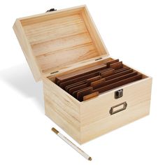 a wooden box filled with lots of compartments