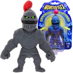 the action figure has an orange mohawk on it's head and is wearing a gray suit