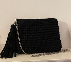 Do you have exquisite taste? So  this beautiful bag was made for you 🥰 black  bag will look good in any season of the year  I hope the future owner of this bag loves it as much as I loved making it ❤️ Dimensions    Length: 25 cm  height: 16 cm   it's lined ✨  silver  strap chain length: approx 117 centimetres a perfect gift or a delightful treat for yourself ✨✨ Do not wash , clean it carefully with a damp sponge 🧽  For your different colour choice , please contact me 🥰😉 Note that actual colo Black Woven Crossbody Shoulder Bag, Black Woven Satchel Shoulder Bag, Trendy Crochet Crossbody Bag With Braided Handles, Trendy Black Shoulder Bag With Braided Handles, Trendy Black Tote Evening Bag, Trendy Black Evening Tote Bag, Handmade Black Bag As A Gift, Black Crochet Satchel With Braided Handles, Handmade Black Bag As Gift