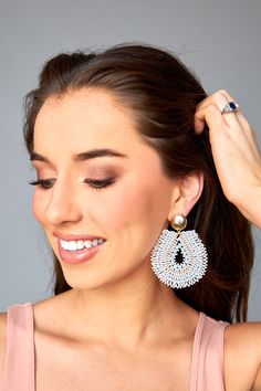 Be bold in these beaded statement earrings! Pair them with your favorite BuddyLove dress to complete your look! This item is FINAL SALE. Elegant Beaded Earrings For Summer Party, Elegant Summer Beaded Drop Earrings, Elegant Summer Chandelier Earrings With Dangling Beads, White Beaded Earrings For Summer, Chic Pearl Drop Chandelier Earrings For Party, Elegant Summer Beaded Earrings With Dangling Beads, Elegant Summer Earrings With Dangling Beads, Elegant Summer Beaded Dangling Earrings, Summer Party Pearl Drop Earrings