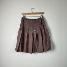 vintage y2k 00s era brown fairy midi skirt with sequin detail. fully lined Label: fond Material: 100% cotton Size: (label size M) refer to measurements for fit details Excellent Vintage Condition - missing the hook on the hook and eye closure, very easy to fix or wear without. MEASUREMENTS IN INCHES (unstretched + laid flat, double where needed) : can be worn at waist or hip depending on measurements Waist: 14 Hip: 19 Length: 22.5 Each vintage piece has been preloved. Minor fading + wear is expected & often adds to the character. All items are cleaned & from a smoke & pet free building. We hope you appreciate this find as much as we do. FINAL SALE Y2k Style Brown Skirt For Spring, Y2k Brown Skirt For Spring, Brown Y2k Skirt For Spring, Brown Y2k Summer Skirt, Brown Fairy, Midi Skirt Vintage, Boho Fairy, Le Crochet, Fit Details