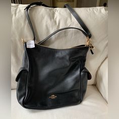 Never Used New With Tag Coach Bag. Black Leather. Detachable Handle With 7" Drop. Detachable Strap With 20 3/4" Drop For Shoulder Or Crossbody Wear. 10 3/4" (L) X 11 3/4" (H) X 5 1/4" (W). Got As Gift And Never Used Versatile Coach Bags With Detachable Handle, Versatile Coach Bag With Detachable Strap, Versatile Coach Bag With Adjustable Strap, Versatile Coach Bag With Gold-tone Hardware, Versatile Coach Shoulder Bag With Gold-tone Hardware, Versatile Coach Tote Bag, Versatile Coach Bags With Double Handle, Versatile Coach Bag With Double Handle, Versatile Coach Bags For On-the-go