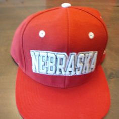 Brand New Adidas Nebraska Snapback Hat. Never Worn And Still Has The Hanging Tag. Some Minor Dust From Sitting. Casual Flat Brim Hats For College, Casual Adjustable University Red Baseball Cap, Casual University Red Adjustable Baseball Cap, Casual Red Baseball Cap For Fans, Adidas Cotton Snapback Baseball Cap, University Red Snapback Baseball Cap, White Collegiate Snapback Hat, Casual University Red Snapback Baseball Cap, University Red Casual Snapback Hat