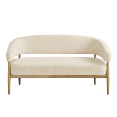 a white couch sitting on top of a wooden frame