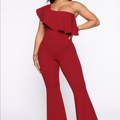 Brand New, Never Worn All Red One Shoulder Ruffled Jumpsuit. Full Stretch, Flare Bottom. Chic Red High Waist Jumpsuits And Rompers, Chic Red High-waisted Jumpsuits And Rompers, Flirty Red Jumpsuits And Rompers For Date Night, Red Strapless Jumpsuit For Night Out In Spring, Red Strapless Jumpsuit For Spring Night Out, Red Stretch Jumpsuit For Date Night, Red High Waist Jumpsuits And Rompers For Party, Red High-waist Jumpsuits And Rompers For Party, Flirty Red Fitted Jumpsuits And Rompers