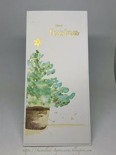 a card with a christmas tree on it