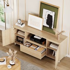 a wooden table with books and pictures on it