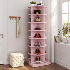 there is a pink shelf with shoes on it