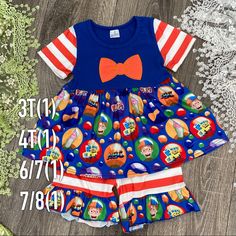 Adorable Girls 2pc Blippi Outfit Includes Embroidered Blue Bow On Top Of Skirted Shirt And Ruffle Shorts. Cotton Short Sleeve Sets For Playdate, Casual Short Sleeve Sets For Playdate, Cute Multicolor Sets For Playdate, Fun Cartoon Print Short Sleeve Sets, Multicolor Cotton Play Sets, Fun Cotton Sets For Playdate, Cute Cotton Sets For Daycare, Playful Matching Sets For Playtime, Cotton Sets For Playdates