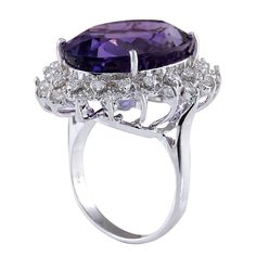 Stamped: 14K White Gold Total Ring Weight: 7.0 Grams Ring Length: N/ARing Width: N/A Gemstone Weight: Total Natural Amethyst Weight is 18.80 Carat (Measures: 20.10x15.15 mm) Color: Purple Diamond Weight: Total Natural Diamond Weight is 1.00 Carat Quantity: 36 Color: F-G, Clarity: VS2-SI1 Face Measures: 27.40x23.30 mm Sku: [702374W] Elegant Amethyst Crystal Ring With Center Stone, Elegant Amethyst Crystal Ring With Prong Setting, Elegant Purple Crystal Ring With Prong Setting, Elegant Ring With Amethyst Center Stone, Luxury White Gold Amethyst Ring With Diamond, Elegant Amethyst Rings With Accent Stones, Elegant Purple Ring With Center Stone, Luxury Purple Platinum Rings, Elegant Amethyst Rings For Wedding