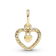 Always shine bright with the Sparkling Double Heart Dangle Charm. Hand-finished in 14k gold, this design features a heart-shaped frame set with sparkling cubic zirconia, with a small polished heart detail dangling in the center. Style this piece with other 14k gold charms for a glowing look or team with sterling silver designs to allow the heart-shaped motif to stand out. Alternatively, gift this style to someone close to you as a token of your love. Elegant Gold Charms For Valentine's Day, Elegant Dangle Charms For Valentine's Day, Elegant Heart Charm For Anniversary, Elegant Valentine's Day Dangle Charms, Elegant Yellow Gold Charms For Valentine's Day, Elegant White Gold Heart Pendant Charm, Elegant Yellow Gold Heart Charm, Elegant Heart Pendant Charm With Beads, Elegant Yellow Gold Heart Pendant Charms