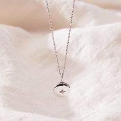 Our new Round Mini Locket Necklace is a dainty way to celebrate the love in your life! This tiny but meaningful necklace opens with space inside for two initials - perfect for you and your partner as a reminder that it all started with you falling in love. Or, engrave any two initials that are special to you! available in gold vermeil, sterling silver and 14k yellow gold locket can be engraved inside with one initial per side (uppercase only) hangs on adjustable cable chain locket measures 10mm in diameter gold vermeil and sterling silver lockets have a cubic zirconia stone in the front center Dainty Engraved Sterling Silver Locket Necklace, Sterling Silver Initial Necklace With Birthstone For Everyday, Everyday Sterling Silver Initial Necklace With Birthstone, White Gold Necklace With Si Clarity As A Gift, Silver Dainty Initial Pendant Locket Necklace, Silver Dainty Locket Necklace With Initial Pendant, Dainty Silver Initial Pendant Locket Necklace, Tiny Sterling Silver Charm Necklaces For Anniversary, Tiny Sterling Silver Charm Necklace For Anniversary