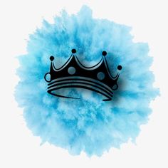 a black crown sitting on top of blue powder