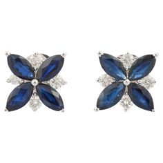 Studs create a subtle beauty while showcasing the colors of the natural precious gemstones and illuminating diamonds making a statement. Marquise cut blue sapphire earrings in 18K gold. Embrace your look with these stunning pair of earrings suitable for any occasion to complete your outfit. PRODUCT DETAILS :- > Material - 18K Solid White Gold > Gemstone - Blue Sapphire > Gemstone shape - Marquise > Gemstone Weight - 2.34 ct > Gemstone pcs - 8 > Gemstone Size - 6 x 3 mm > Diamond Weight - 0.35 ct