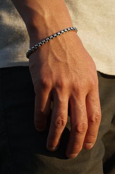 A refined essential for every man's jewelry collection. Crafted with precision, our 5mm Round Box Chain Bracelet transitions from day to night with ease. Wear it alone or anchor your stack with this staple piece. Sterling Silver 5mm Thickness Push Closure Determining your bracelet size: Encircle your wrist with a flexible tape measure and record the measurement. Because of the larger 5mm link size, add 3/4 to 1 inch to your wrist measurement for a comfortable bracelet fit. Choose the closest sta Pearl Jewelry Gift, Round Box, Stacked Jewelry, Gold Collection, Tape Measure, Box Chain, Staple Pieces, Bracelet Sizes, Ring Necklace