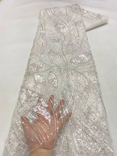 This high quality Fabric is measured in 5 Yards With Embroidered Beading and Sequin. It is soft, very delicate and beautiful. This high Quality Fabric is made with Fashion embroidered rhinestones can be used in making party wedding dresses, skirts, shawls, scarves and other other fashion apparels as you would like. Size : Length : 5 yards (180 inch). Width: 50 inch (Please allow slight deviation for the measurement data ,±1 inch) Material: 100% Polyester, Tulle Lace Fabric, Eco-Friendly embroide Color Durazno, Strung Beads, African Lace, Handmade Fabric, Tulle Lace, Fabric Shop, Wedding Party Dresses, Fashion Fabric, Lace Fabric