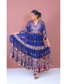 √ 100% Handmade √ 100% Chiffon  √ it looks so cute when you wear it √ Very comfortable √ it is made very carefully √ A very ideal gift to give √ Ehiopian dress √ 58 inchs Long (Shoulder to Bottom) and from shoulder to shoulder 18 Inches. √   It Comes with the Scarf/Headband (Netela) and as Shown on the picture. ● Hand wash Blue Casual V-neck Chiffon Dress, Bohemian Chiffon Floral Dress, Bohemian Long Sleeve Flowy Chiffon Dress, Flowy Long Sleeve Bohemian Chiffon Dress, Blue Long Sleeve Chiffon Dress For Summer, Long Sleeve Blue Chiffon Summer Dress, Bohemian Beach Midi Chiffon Dress, Bohemian Long Sleeve Chiffon Dress For Garden Party, Bohemian Midi Chiffon Beach Dress