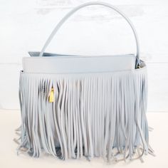 Are feeling the fringe? Theres nothing like a fringe statement handbag to bring a cute outfit together! This bag is a soft vegan leather with gold hardware and 3 zipper compartments. Each of these handbags can easily convert from a handbag to a crossbody bag with just a swap of a strap! Free shipping & Free gift included with purchase! Statement Handbag, The Fringe, Black Leather Handbags, Pink Sky, Cute Outfit, Leather Handbag, Free Gift, Gold Hardware, Leather Handbags