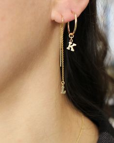 "Get personal with this letter threader earring in 14 carat gold filled or sterling silver. Get one or Buy 2 of the same, or, add 2 different initials to your basket to create a unique look. Choose your kids initials, your loved ones or go for O and X for hugs and kisses. So comfy you never need take them off Layer up with our matching initial hoops L E T S . T A L K . E A R R I N G S ✤ Available in 14k gold filled and Sterling Silver ✤ Available in one size - From the ear lobe it hangs approx 3 Personalized 14k Gold Earrings For Everyday, Everyday Personalized 14k Gold Earrings, Everyday Jewelry With Dangling Initial Pendant Charms, Everyday Jewelry With Dangling Charms And Initial Pendant, Elegant Personalized Hoop Earrings For Everyday, Personalized Dainty 14k Gold Earrings, Gold Earrings With Initials In 14k Gold, Personalized Yellow Gold Earrings For Everyday Wear, Personalized Everyday Hoop Jewelry