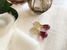 These simple, sophisticated earrings are great for everyday wear. With amethyst-toned Czech glass set against luxurious gold plated silver or sterling silver, these earrings are truly the perfect pair to add an unexpected pop of colour to your everyday essentials.  A D D I T I O N A L * D E T A I L S - Hand crafted with Czech glass beads from Jablonec nad Nisou, an area renowned for its traditional production of high quality Czech glass.  - Available in sterling silver or gold plated sterling si Elegant Teardrop Earrings With French Hook For Gift, Elegant Gift Teardrop Earrings With French Hook, Long Drop French Hook Earrings For Gift, Teardrop French Hook Earrings As Gift, Elegant Purple Earrings For Everyday, Gift Teardrop Crystal Earrings With French Hook, Silver Czech Glass Drop Earrings, Purple Czech Glass Earrings With Faceted Beads, Purple Czech Glass Dangle Earrings