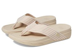 FitFlop Surfa Slip-on Sandals - Women's Sandals : Stone Beige Mix : for the women's FitFlop sizing guide. Click to learn more about the biomechanically engineered, ergonomic FitFlop&amp,#174, footbed. , OPTIMAL FLIP-FLOPS: The FitFlop Surfa and sandy beaches are a match made in heaven, featuring a soft fabric upper in a thong sandal silhouette and our sophisticated Microwobbleboard technology. SLIP-ON STYLE: Simple and modern flip flops feature an easy slip-on construction along with a toe post Beach Sport Sandals With Removable Insole In Beige, Beige Sport Sandals With Removable Insole For Beach, Beige Sport Sandals With Cushioned Footbed For Beach, Beige Cushioned Sport Sandals For Beach, Ergonomic Sandals For Summer Beach, Ergonomic Sandals For Beach In Summer, Beige Flip Flops, A Match Made In Heaven, Slip On Sandals