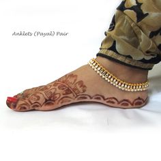 Antique aged unique Anklet for wedding purpose. Long hook chain allows for a customized fit.Perfect Fashion Jewelry which is Ideal for party wear.  It gives ethnic and stylish look. Best gift item for yourself and your loved ones. It is made of light weight Metal Attractive design that can be wear at any occasion, weddings, parties , casual or as a gift. By default this anklet is free size & adjustable fit to all adult size and its length is 23 CM excluding chain and 5.5 CM chain is extra for make it adjustable. If you want this anklet for children then you can mention custom length in CM excluding chain. * You Get: 2 Piece * Color: As shown In Pictures * Weight:  52 gm approx. * Size: Adjustable By default this anklet is free size & adjustable fit to all adult size and its length is 23 CM Traditional Gold Beaded Anklets, Traditional Anklets For Puja, Adjustable Traditional Anklets For Puja, Traditional Anklets With Latkans For Gift, White Toe Ring Anklets For Festivals, Festive Toe Ring Anklets For Rituals, Traditional Gold Anklets For Festivals, Temple Jewelry Toe Ring Anklets For Festivals, Traditional Beaded Toe Ring Anklets