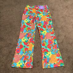 You Will Definitely Turn Heads In These Fabulous Pants! They’re A Bright Floral Pattern With A Wide Flare Leg. I Absolutely Love These But Are Too Big. Waist 15 Inches Inseam 34 Inches Rise 7 Inches Colorful Wide Leg Bottoms For Spring, Colorful Wide Leg Cotton Pants, High Waist Colorful Bottoms For Spring, High-waisted Colorful Bottoms For Spring, Colorful High-waist Bottoms For Spring, Colorful Cotton Wide Leg Pants, Colorful Long Pants For Spring, Colorful Fitted Casual Pants, Vibrant Wide Leg Spring Pants