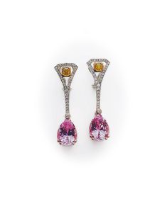 23 Carat Pink Kunzite Drop Earrings with White And Yellow Diamonds A stunning set of long pink-colored earrings in 14K white and pink gold. Its exquisite design boasts natural pink kunzites in pear-shaped cuts adorned with dazzling yellow and white diamonds. The soft yet striking hues of the voluminous kunzite stones reflect a certain gentle radiance that adds loveliness to the overall look. These adorable classy earrings are appropriate for any special occasion signifying the celebration of ele Rosy Drops, Kunzite Gemstone Wedding Jewelry, Pink Diamond Earrings For Formal Events, Fine Jewelry, Luxury Oval Kunzite Jewelry, Luxury Kunzite Yellow Gold Jewelry, Luxury Pink Multi-stone Earrings, Pink Kunzite, Classy Earrings, Colored Earrings