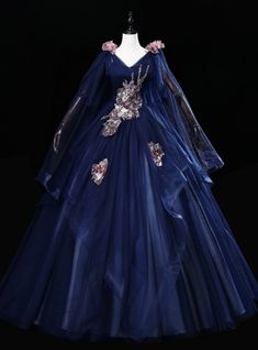 Experience a night of enchantment in this exquisite Navy Blue Tulle V-neck Sequins Embroidery Quinceanera Dress. This elegant ball gown showcases a dazzling v-neckline with delicate sequin embroidery that accents the bodice and flows down to the full skirt. The sequin embroidery is complemented with a tulle fabric and a lovely navy blue hue