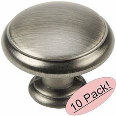 an image of a metal cabinet knob with pink sticker for 10 pack on it