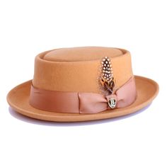 Bruno Capelo If you’re looking to add a piece of history to your outfit, then this wool felt pork pie hat is the hat for you. The oval telescope crown is surrounded by a classic grosgrain ribbon hat band that is finished with a single bow. Featuring a 2" bound brim and semi-crushable construction you will definitely stand out of the crowd with this shape! Brim: 1 7/8" Bound Material: 100% Fine Australian Wool Crown Height: 3.5" Interior: Elasticized Leather Sweatband Hat Band: 1.5"19-Ligne Sweat Different Hat Styles, Popular Hats, Pork Pie Hat, Black Men Fashion Swag, Pork Pie, Bentley Continental, Seiko Watches, Black Men Fashion, Hats For Sale