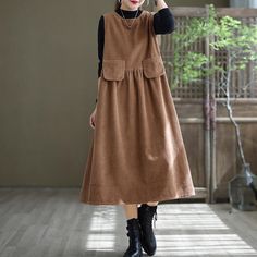 Item Code: 6712004509758 Material: Corduroy Collar: O Neck  Pattern: Solid Color  Highlight: Pocket Season: Spring,Autumn,Winter Washing Recommendations: Hand Wash Cold; Soft Machine Washing; Line Dry; Do not Soak;Classification of Washing; Iron at Low Temperature if Necessary Long Linen Dresses, Corduroy Pinafore, Corduroy Pinafore Dress, Loose Vest, Corduroy Overall Dress, Waistcoat Dress, Mode Abaya, Corduroy Dress, Linen Maxi Dress