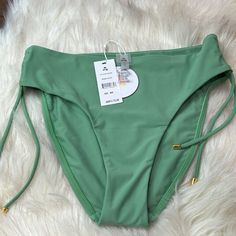 Pq Swim Ruched High Waisted Hygiene Liner Intact Excellent Condition Spring Solid Ruched Swimwear, Ruched Tie-side Bottom Swimwear For Spring, Ruched Tie-side Swimwear For Spring, Green Ruched Bottoms For Vacation, Spring Ruched Beach Bottoms, Spring Green Swimwear With Drawstring, Swim Swim, Womens Swim, Swimming