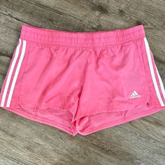 Lightweight Adidas Athleisure Shorts For Spring, Adidas Athletic Shorts For Spring Athleisure, Adidas Athleisure Athletic Shorts For Spring, Pink Adidas Athleisure Shorts, Adidas Pink Shorts For Spring, Adidas Pink Athleisure Shorts, Adidas Stretch Bottoms For Summer, Adidas Summer Workout Bottoms, Adidas Sporty Athletic Shorts For Summer